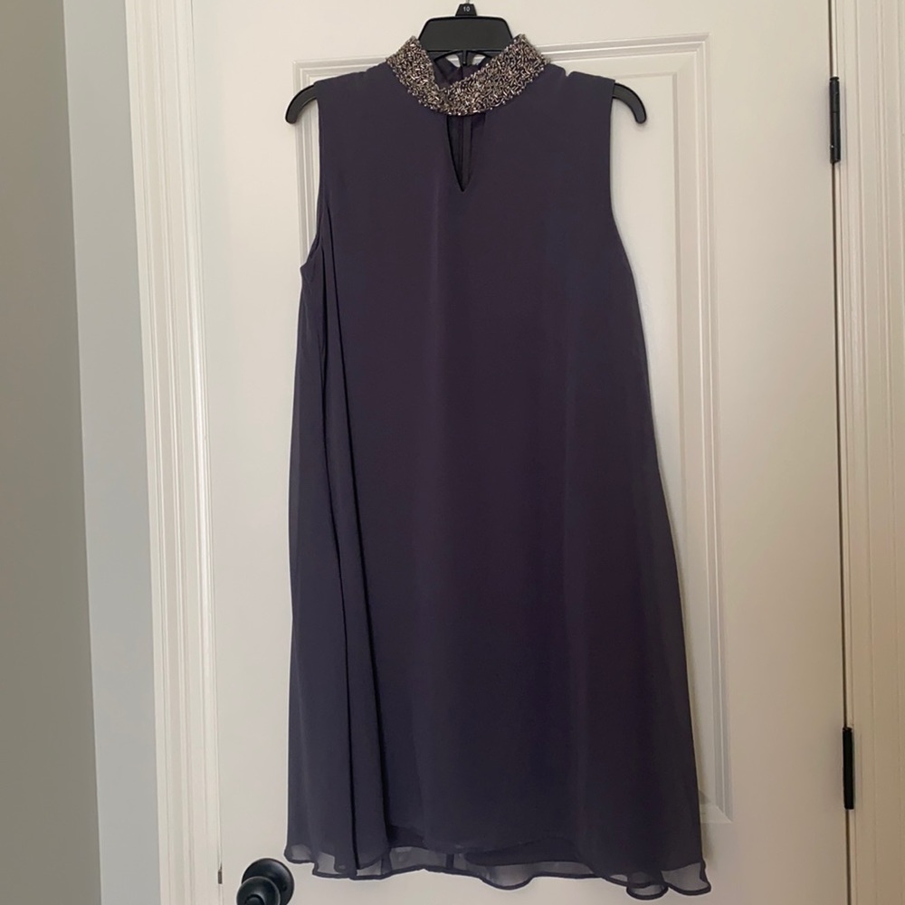 Sleeveless dress with beaded detail collar